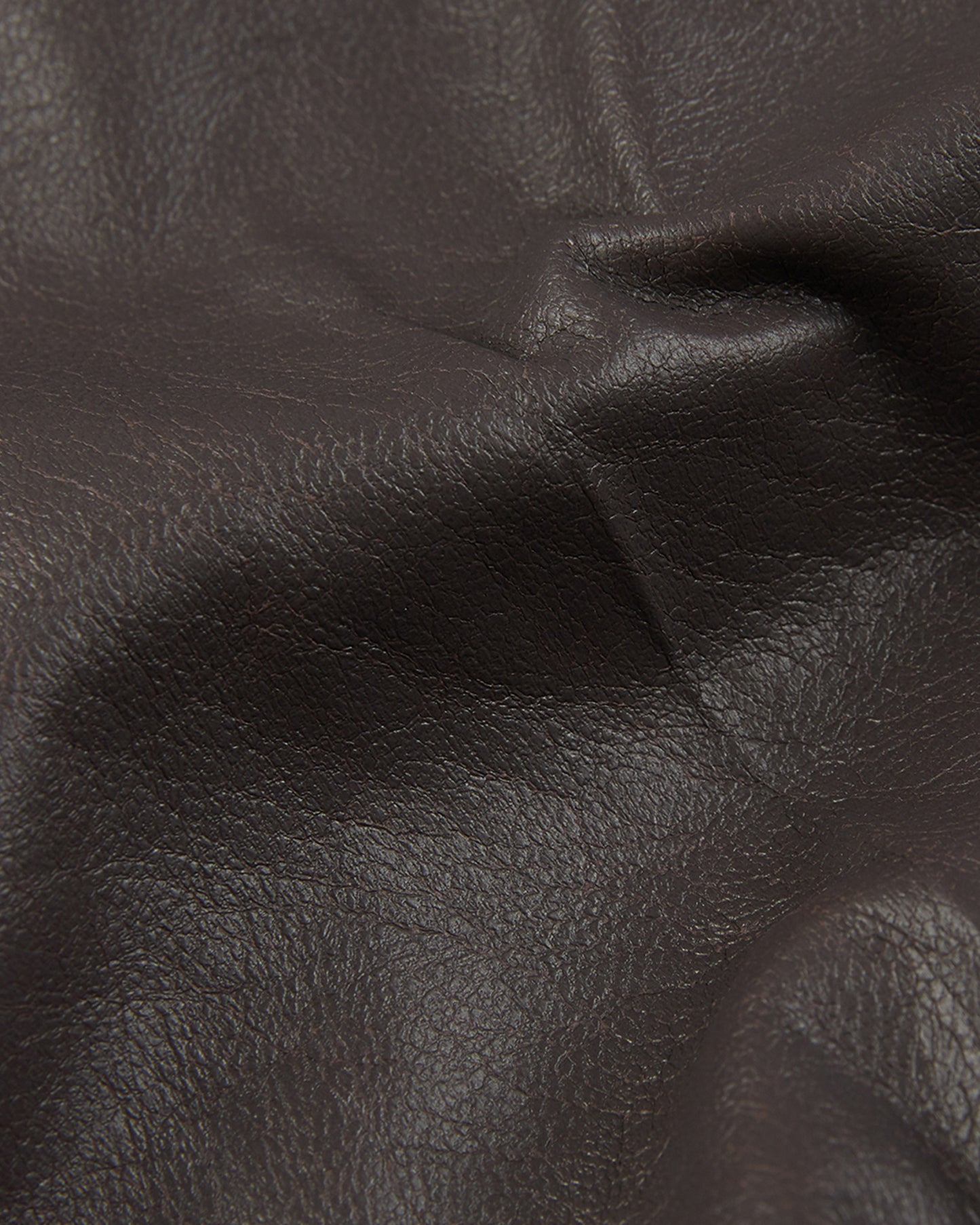 Slim fit trousers in stretch faux leather