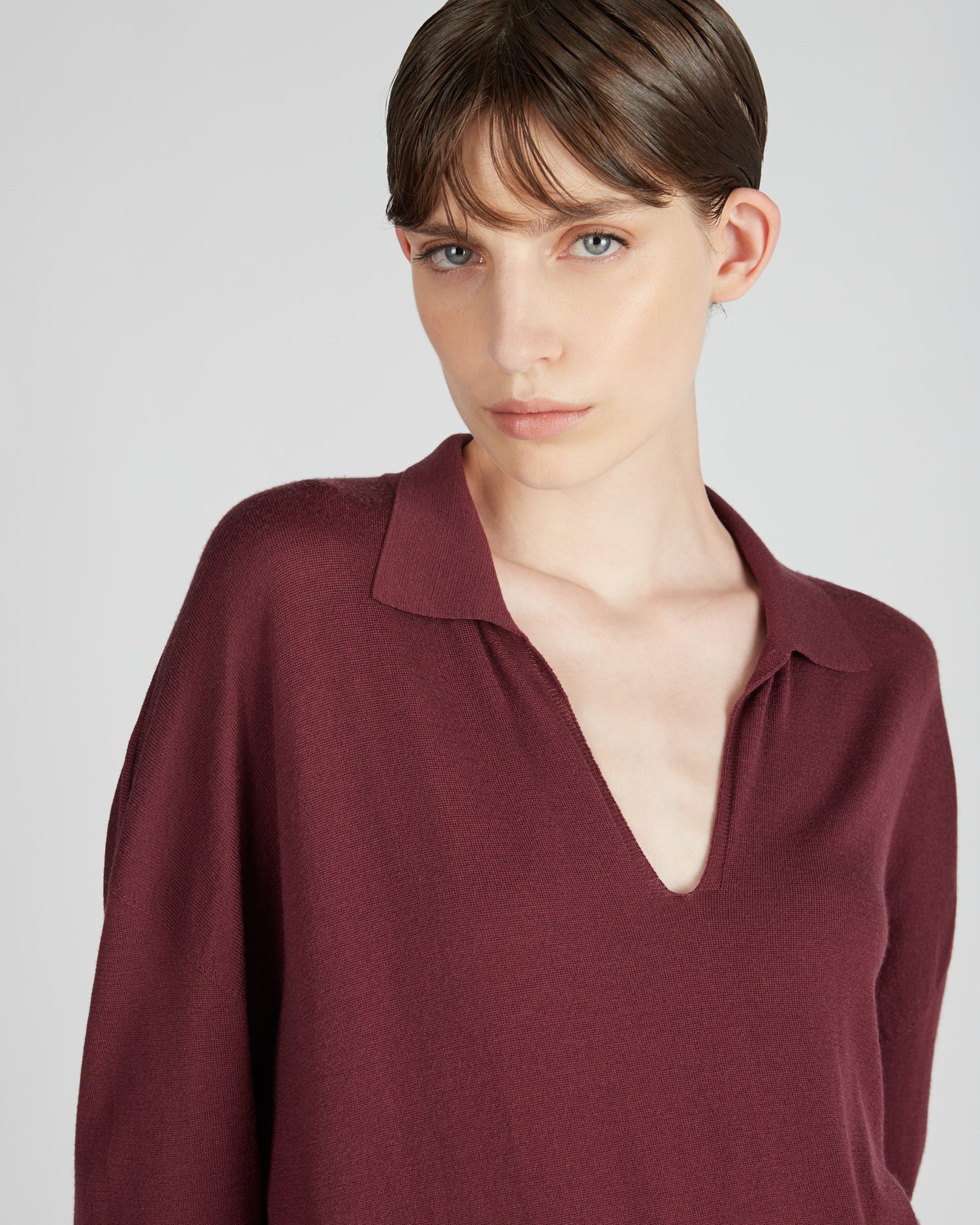 Wide fit V neck polo shirt in Flexwool